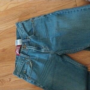 Levis 514 slim straight jeans in a 14 regular. 27x27.